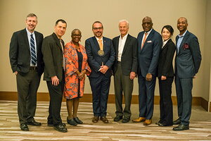 Jerry Dávila, director of the Illinois Global Institute; George Deltas, head of the Department of Economics; Harry E. Preble Dean Venetria K. Patton;  Marcelo Cunha Medeiros, the Jorge Paulo Lemann Chair in Brazilian Economy; Jorge Paulo Lemann; Chancellor Robert J. Jones; economics professor Eun Yi Chung; and Vice Provost Kevin Jackson. 